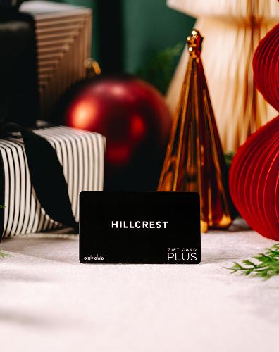 Black Hillcrest Plus gift card among festive holiday decorations