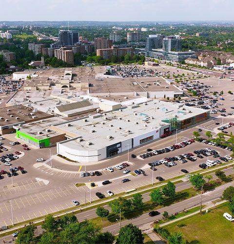 Aerial view of Hillcrest mall and its parking lots in summer
