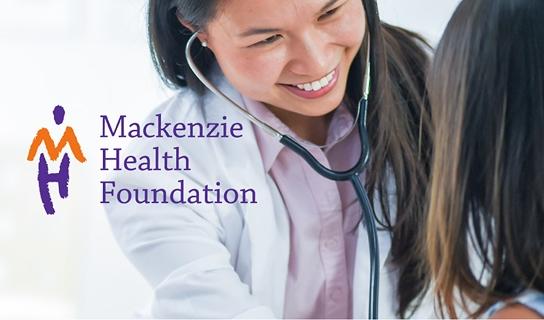 Smiling doctor with a stethoscope beside the Mackenzie Health Foundation logo