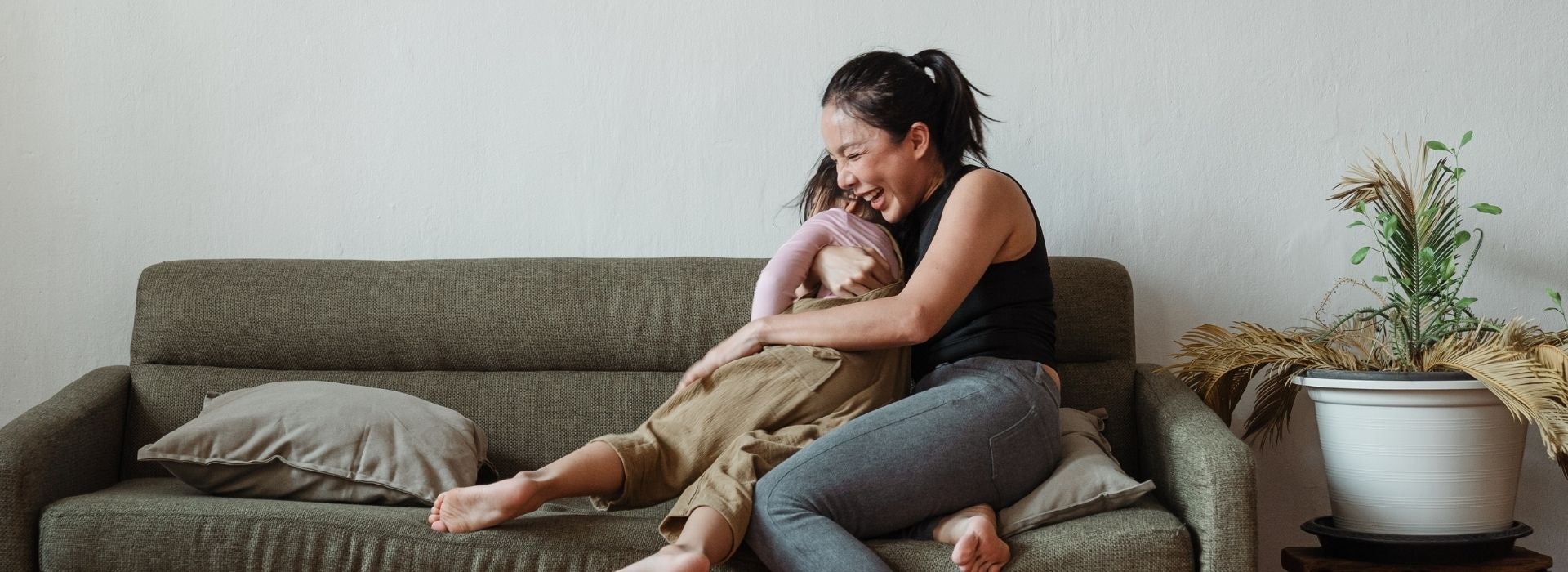 Woman hugging her daughter