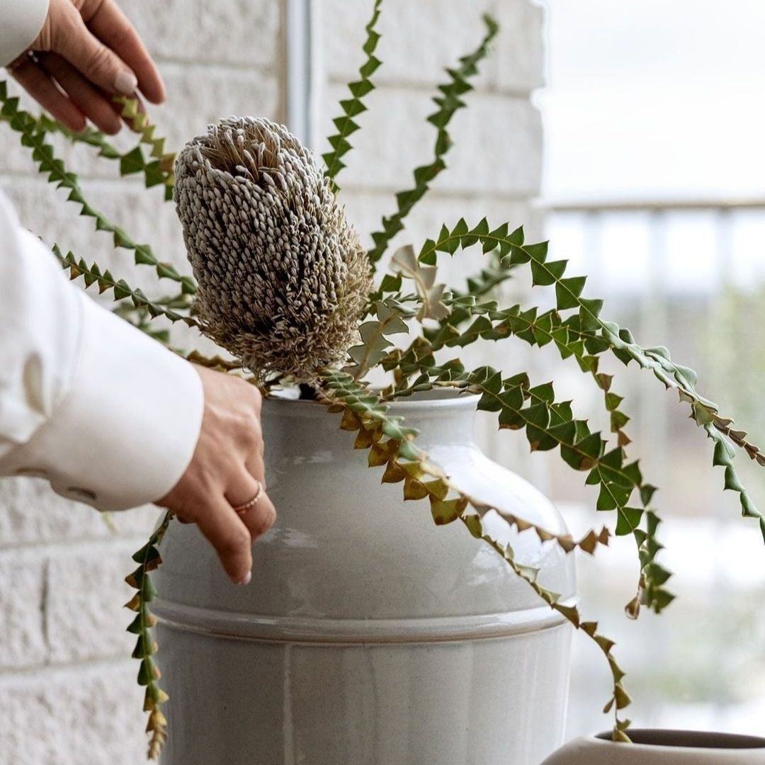 Fried flowers in a metal vase