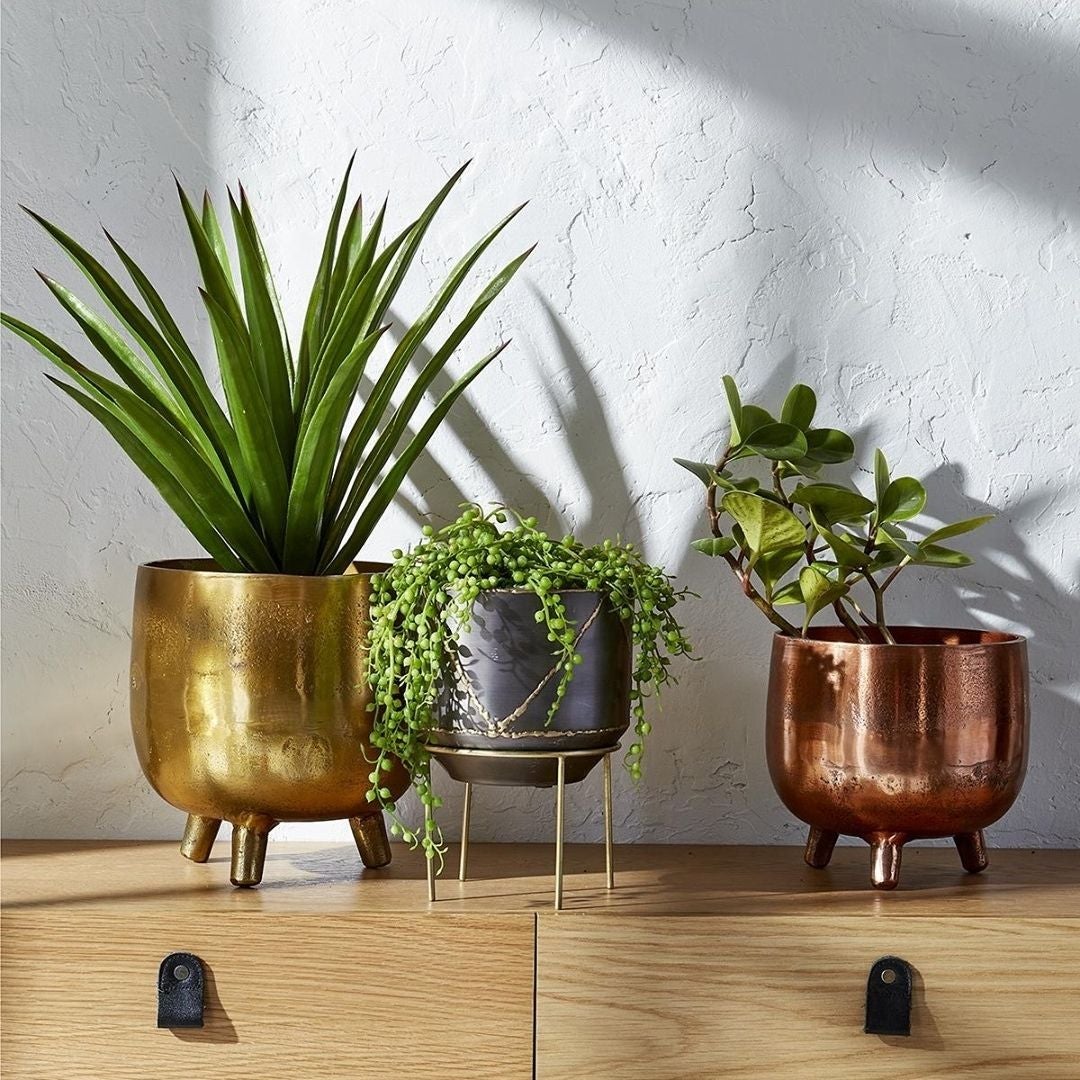 Three metal planters