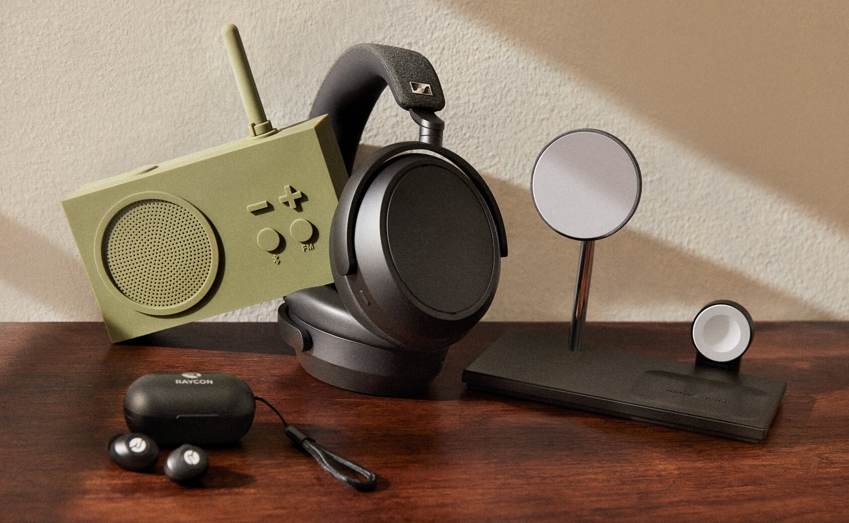 Image of various electronics from Indigo including wireless ear buds and wireless headphones