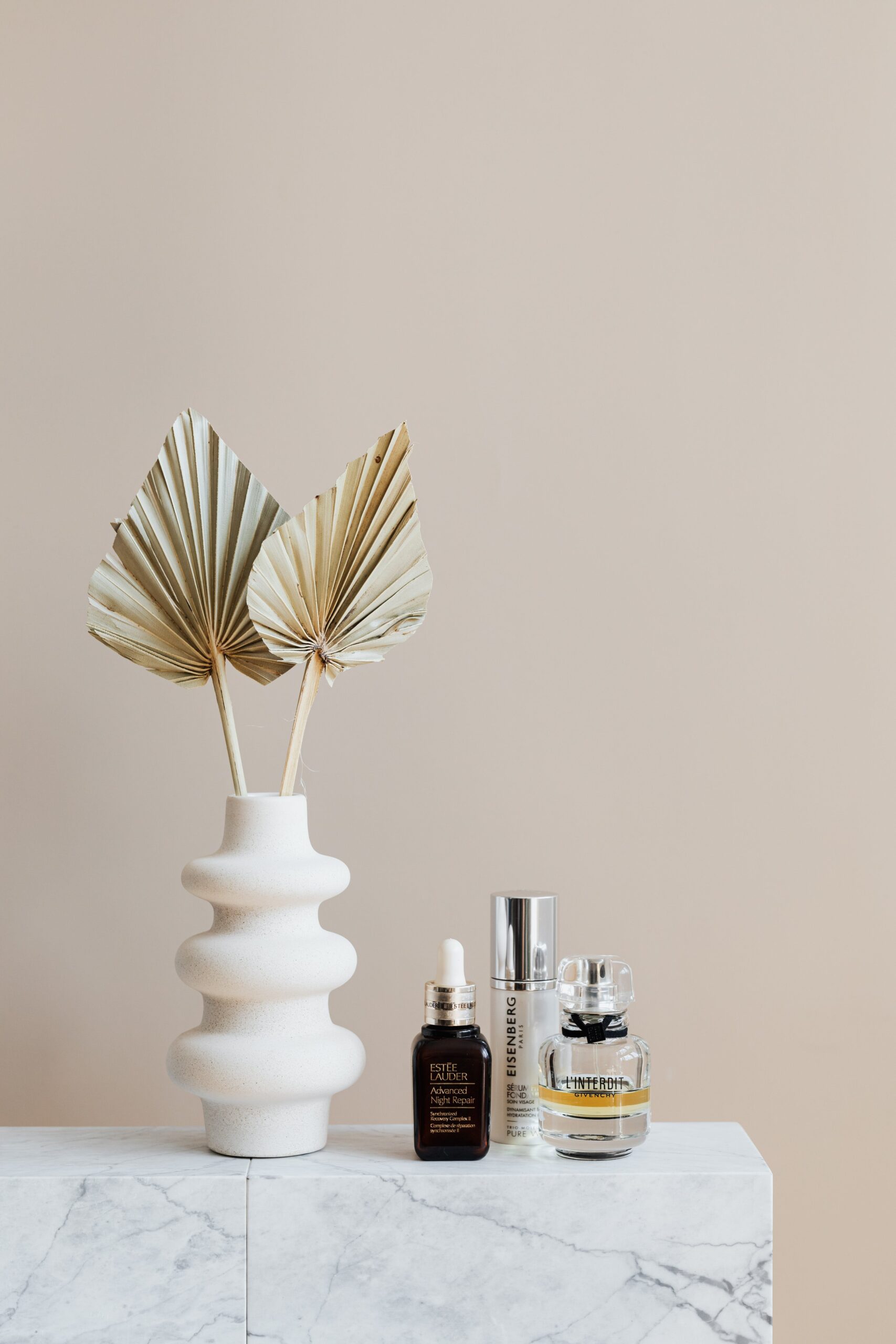 Vase and skincare products.