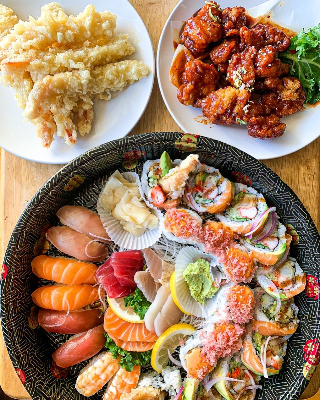 Variety of sushi in take-out containers from Kibo Sushi House