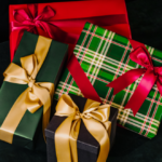 Wrapped gifts in Green, red and gold with Bows