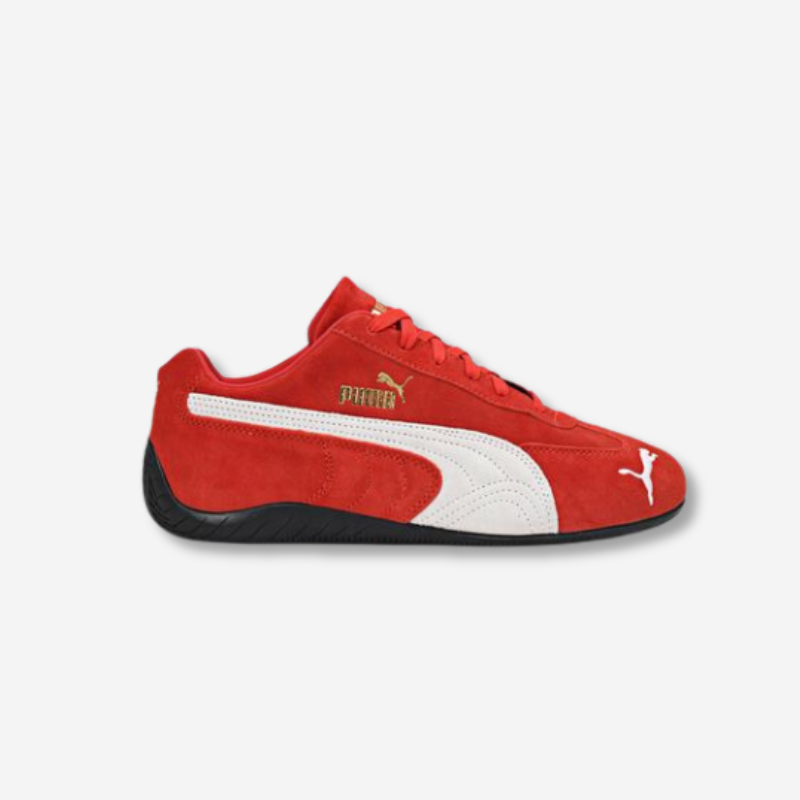 Red Puma shoes with a white stripe